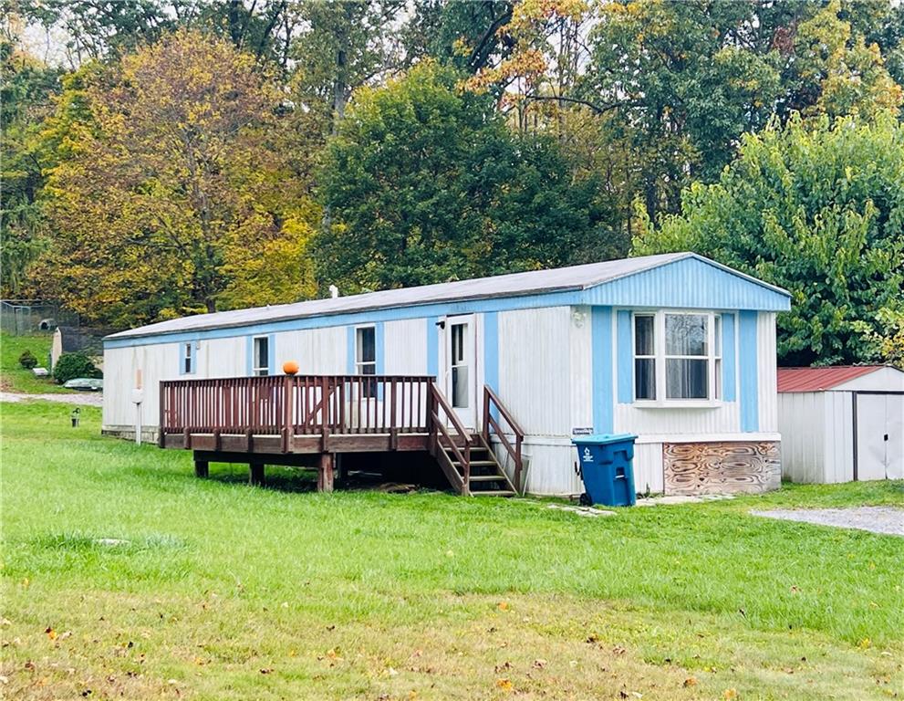 518 Gardner Road New Castle, PA 16101 - Photo 1 of 10 a view of a house with a yard and sitting area