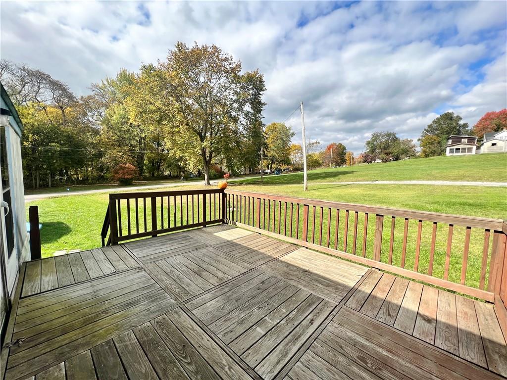 518 Gardner Road New Castle, PA 16101 - Photo 3 of 10 a view of a wooden deck with a yard