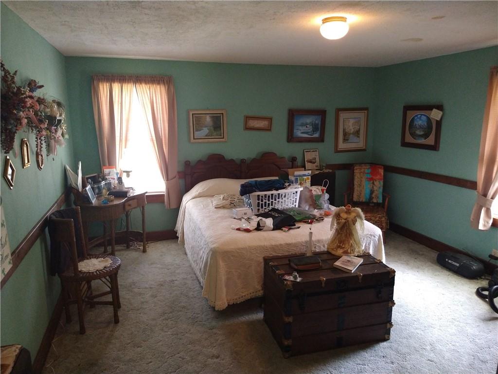 2612 Canoe Ridge Road Rossiter, PA 15772 - Photo 11 of 28 a living room with furniture and a window