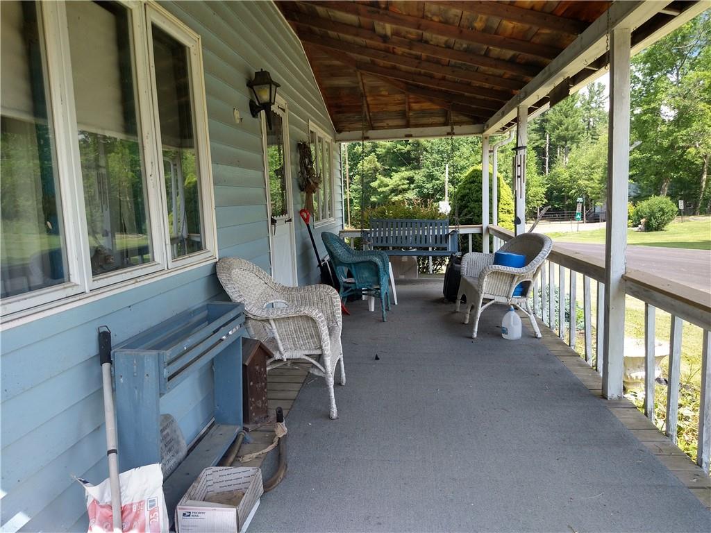 2612 Canoe Ridge Road Rossiter, PA 15772 - Photo 14 of 28 a view of a porch with chairs and backyard