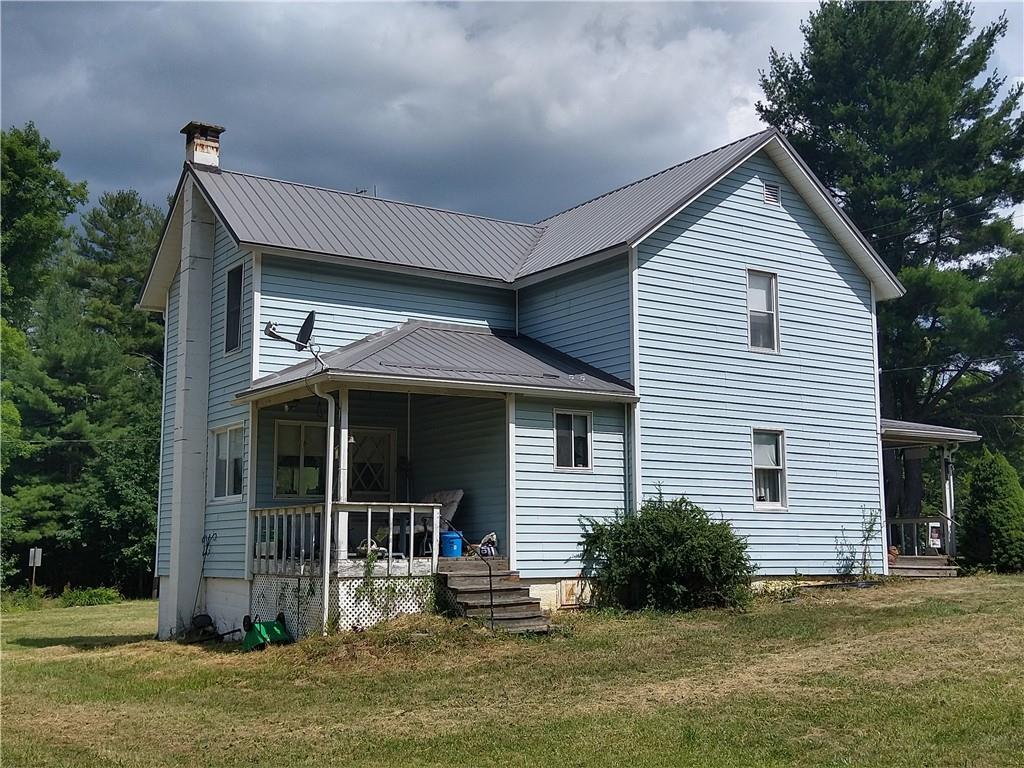 2612 Canoe Ridge Road Rossiter, PA 15772 - Photo 16 of 28 a front view of a house with a yard