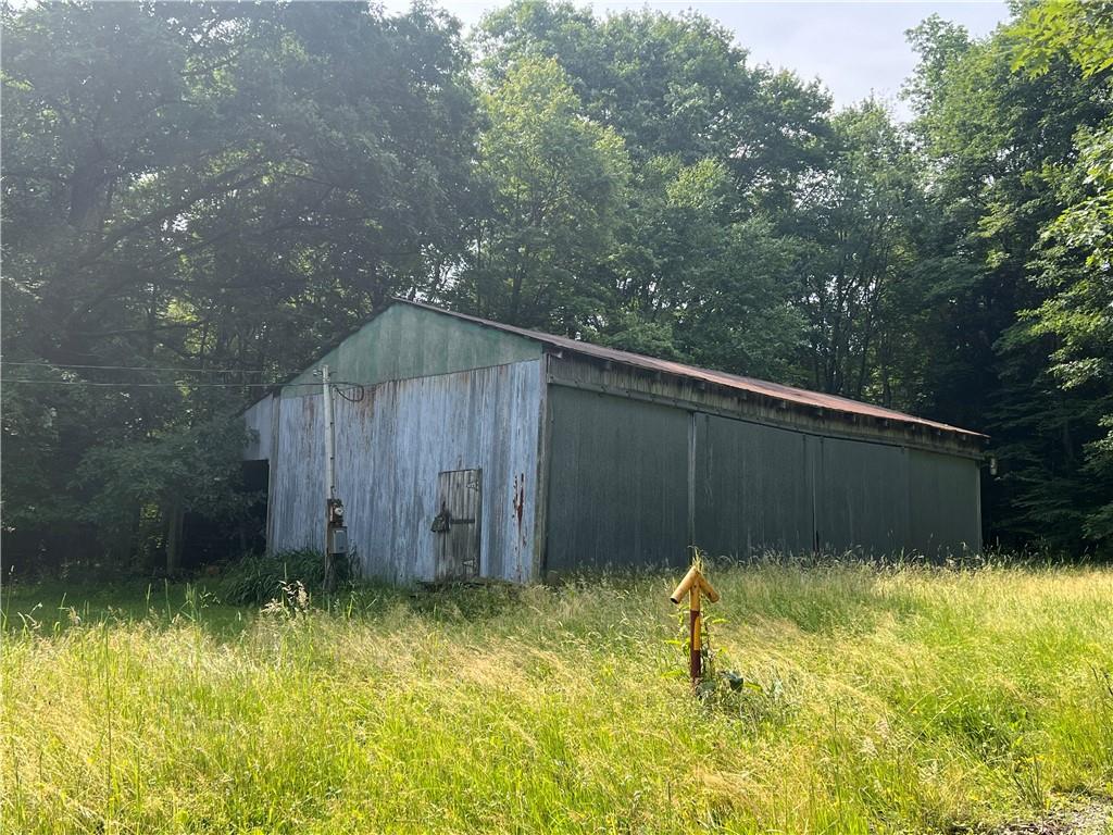 2612 Canoe Ridge Road Rossiter, PA 15772 - Photo 22 of 28 a backyard of a house with lots of green space