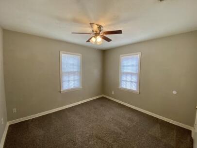 2805 37th Street Lubbock, TX 79413 - Photo 10 of 11 a view of an empty room with a window