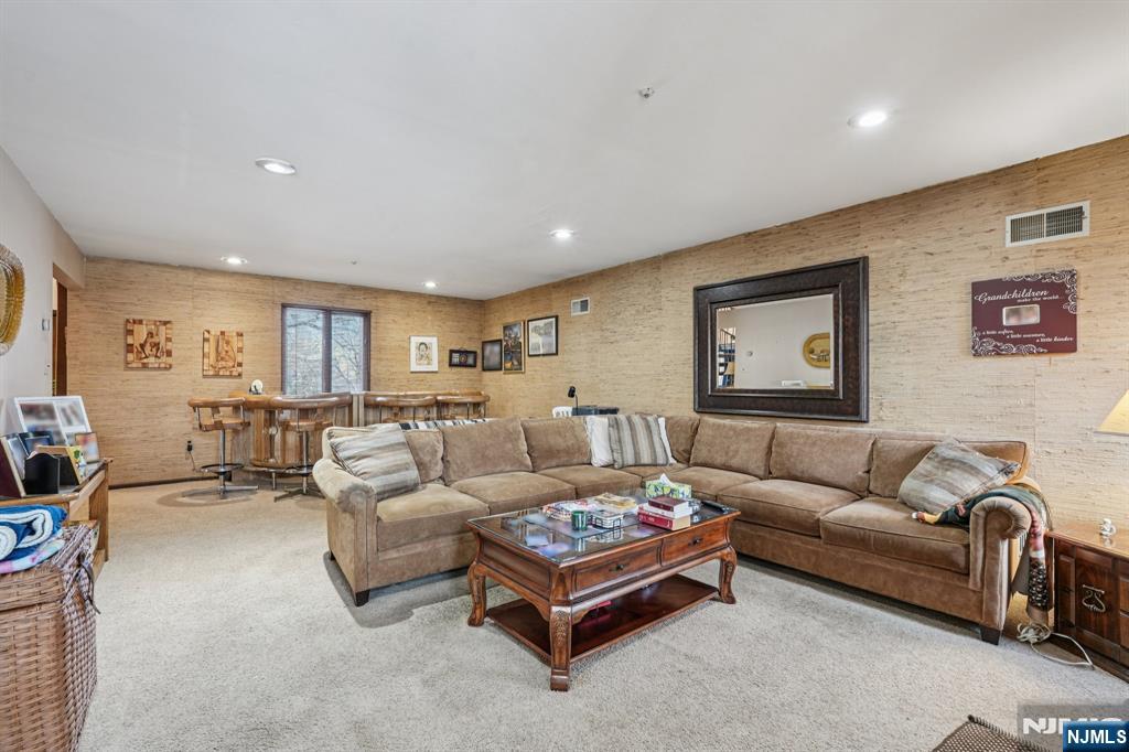 845 Rifle Camp Road Woodland Park, NJ 07424 - Photo 18 of 50 a living room with furniture