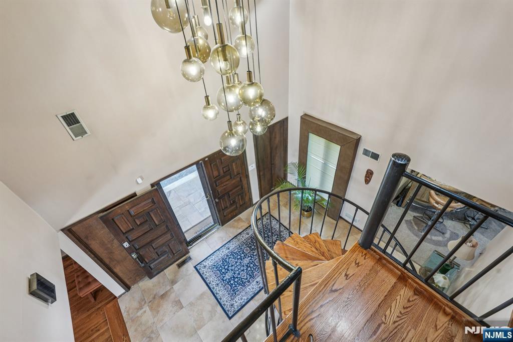 845 Rifle Camp Road Woodland Park, NJ 07424 - Photo 28 of 50 a view of a living room and dining room
