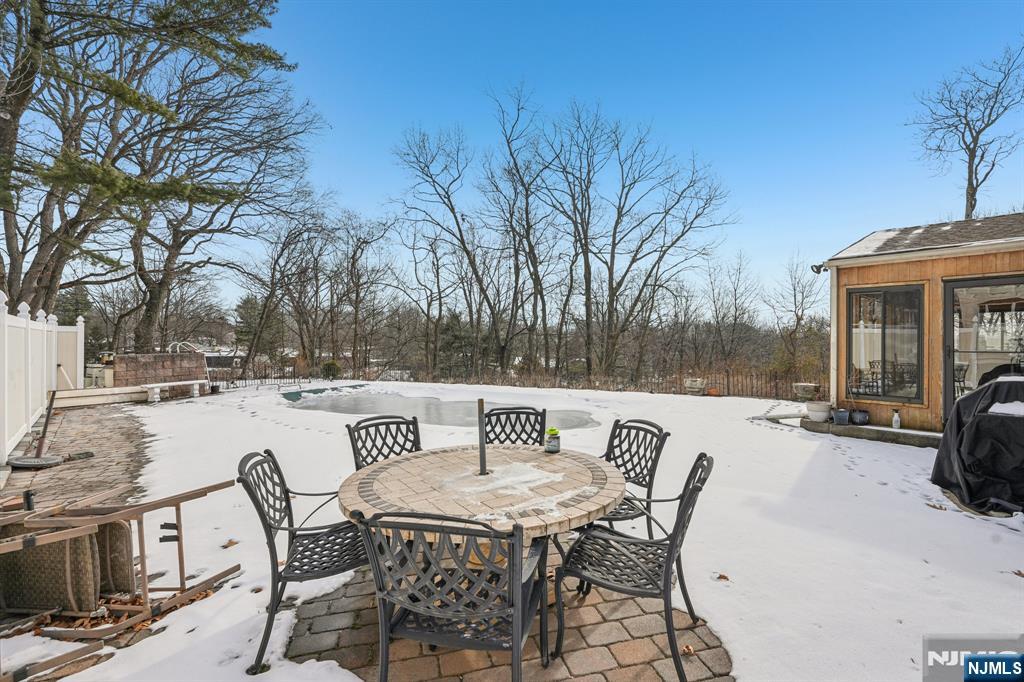 845 Rifle Camp Road Woodland Park, NJ 07424 - Photo 42 of 50 a view of a patio with a table and chairs and couches