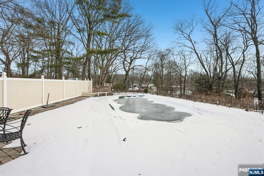 845 Rifle Camp Road Woodland Park, NJ 07424 - Photo 43 of 50 a view of swimming pool with a yard