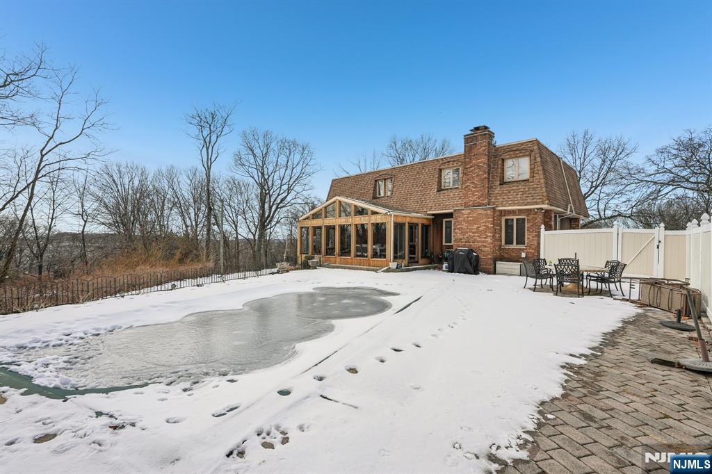 845 Rifle Camp Road Woodland Park, NJ 07424 - Photo 45 of 50 a view of a house with a yard