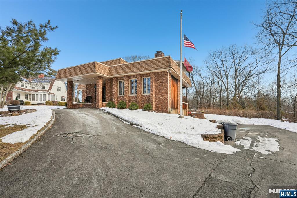 845 Rifle Camp Road Woodland Park, NJ 07424 - Photo 50 of 50 a front view of a house with a yard