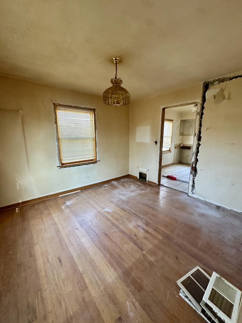 215 North Main Street Mount Prospect, IL 60056 - Photo 15 of 17 a view of empty room with wooden floor
