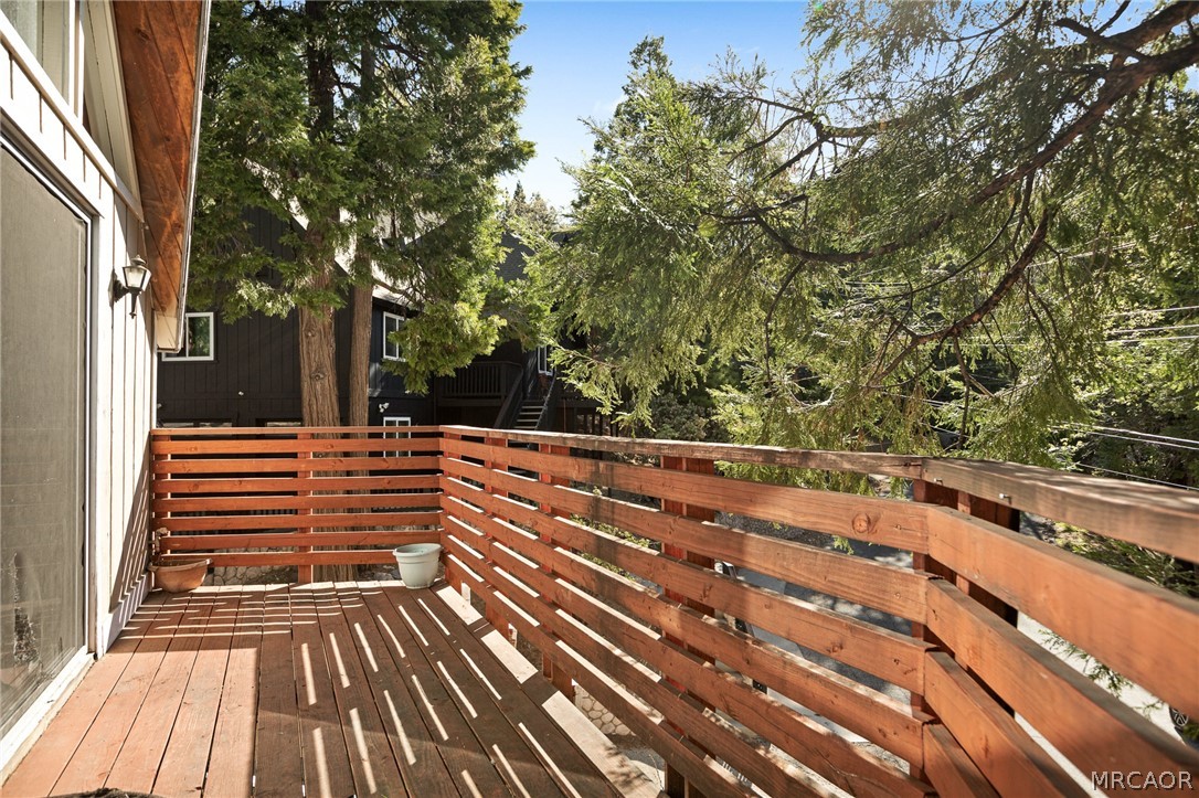 316 Pioneer Road Lake Arrowhead, CA 92352 - Photo 16 of 35 a view of outdoor space with deck and tree