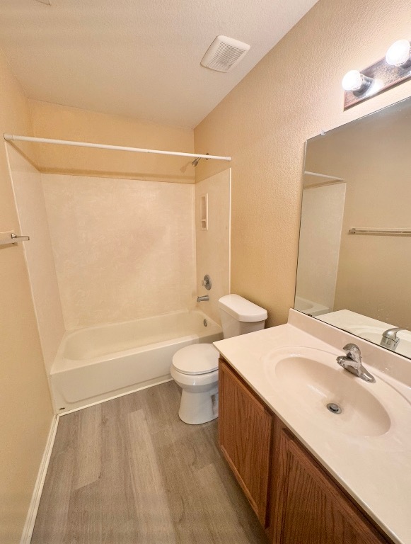 12809 Wood Lily Trail Elgin, TX 78621 - Photo 19 of 26 Full bathroom with vanity, tub / shower combination