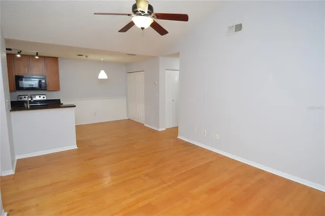 a view of a big room with carpet