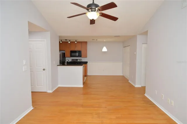 a bathroom with a toilet a sink and a mirror