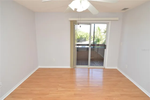 an aerial view of residential houses with outdoor space and river