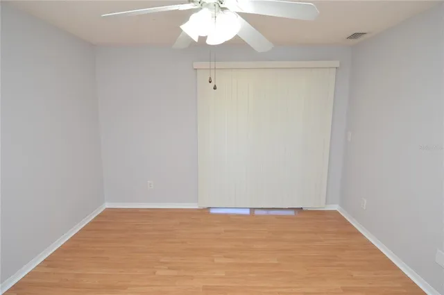 an aerial view of a house with outdoor space pool seating area and yard
