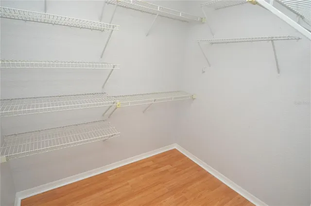 a view of a lobby with furniture and floor to ceiling window