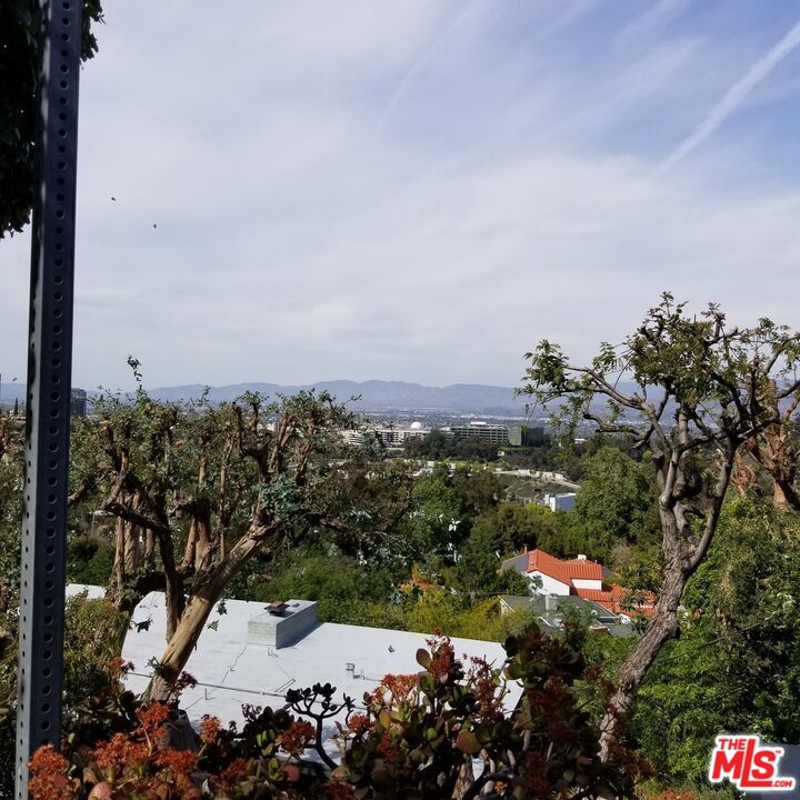 7260 Woodrow Wilson Drive Los Angeles, CA 90068 - Photo 5 of 6 a view of a city