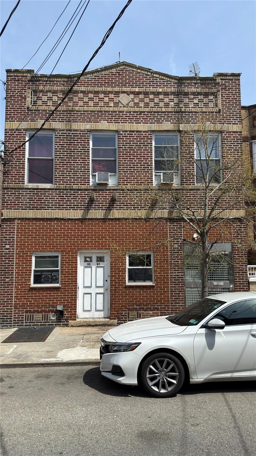 55-07 103rd Street Queens, NY 11368 - Photo 10 of 10 Townhome / multi-family property featuring brick siding and cooling unit