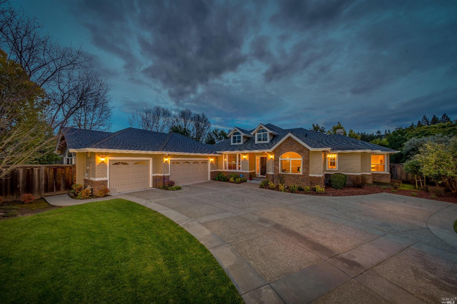 5893 Melita Road Santa Rosa, CA 95409 - Photo 1 of 1 a front view of a house with a yard and garage
