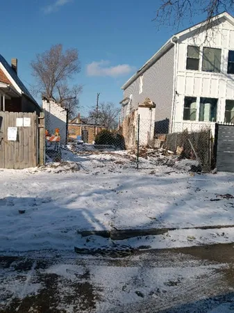 a view of a house with a snow