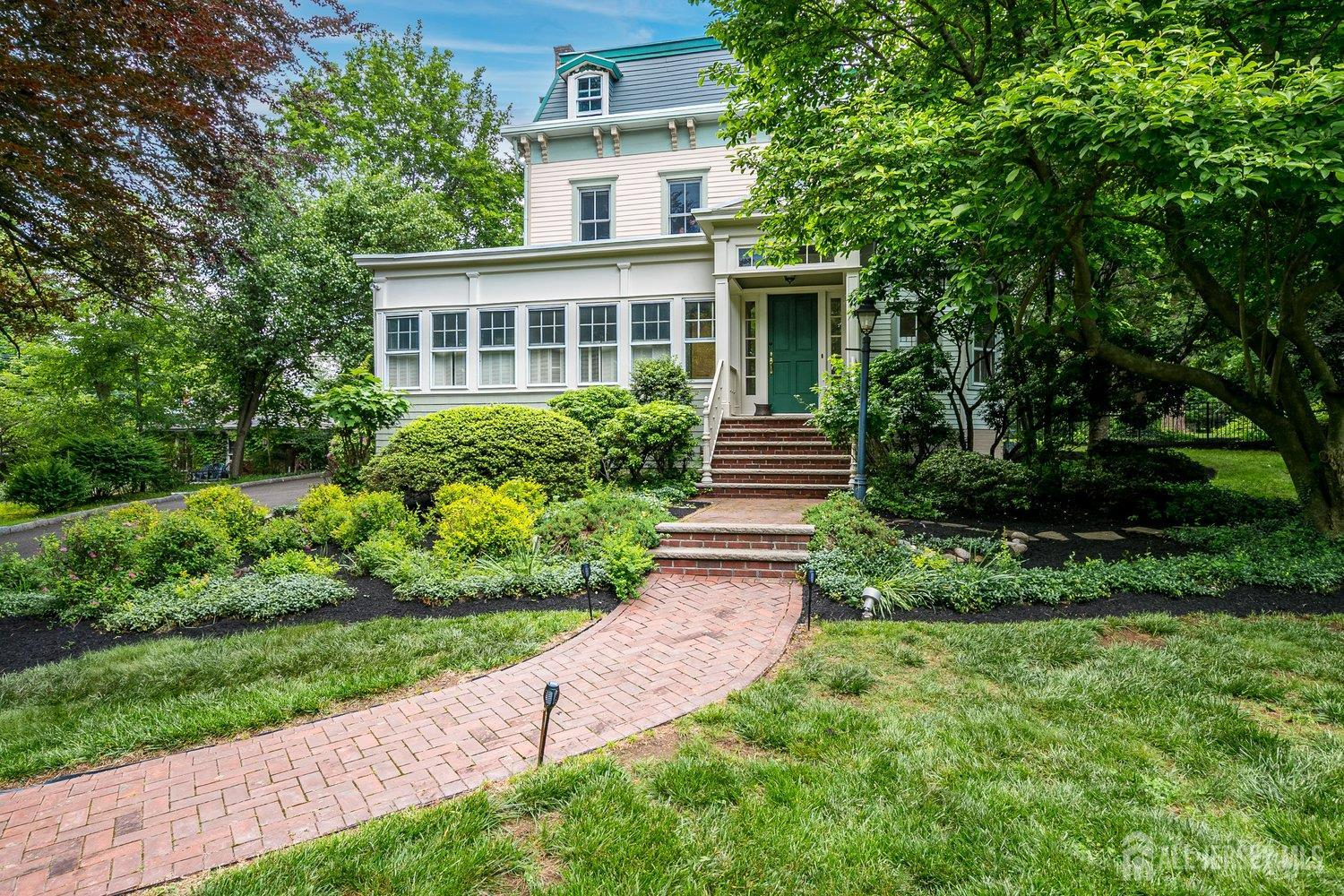 44 Rector Street Metuchen, NJ 08840 - Photo 11 of 65 a view of a house with garden and yard