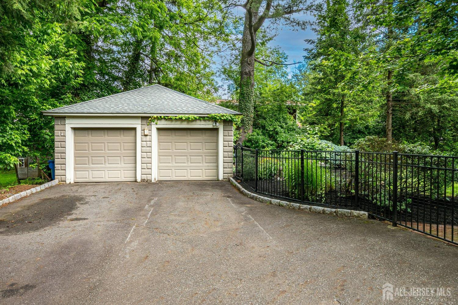 44 Rector Street Metuchen, NJ 08840 - Photo 13 of 65 a front view of a house with a garage