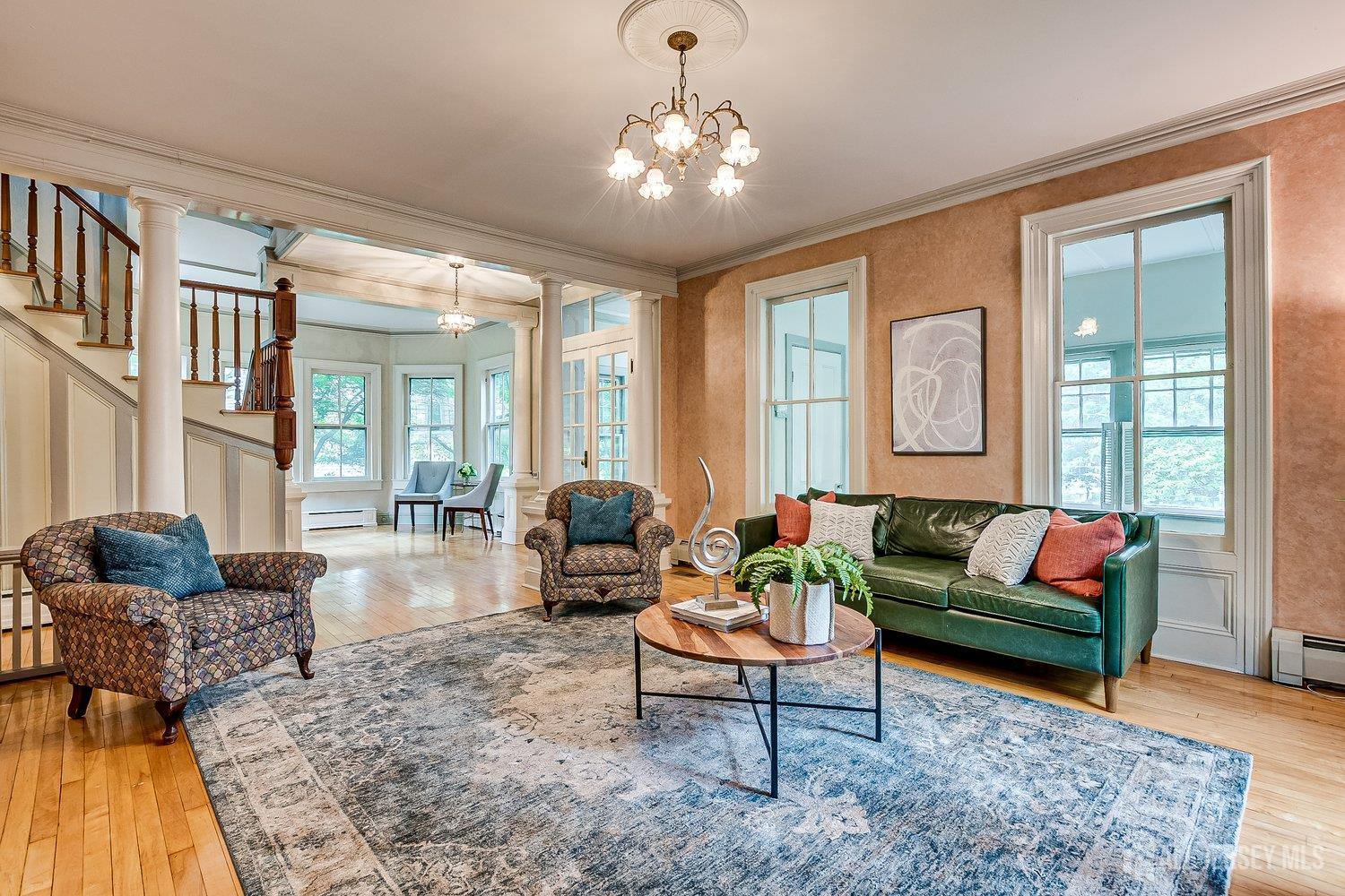 44 Rector Street Metuchen, NJ 08840 - Photo 2 of 65 a living room with furniture and a large window