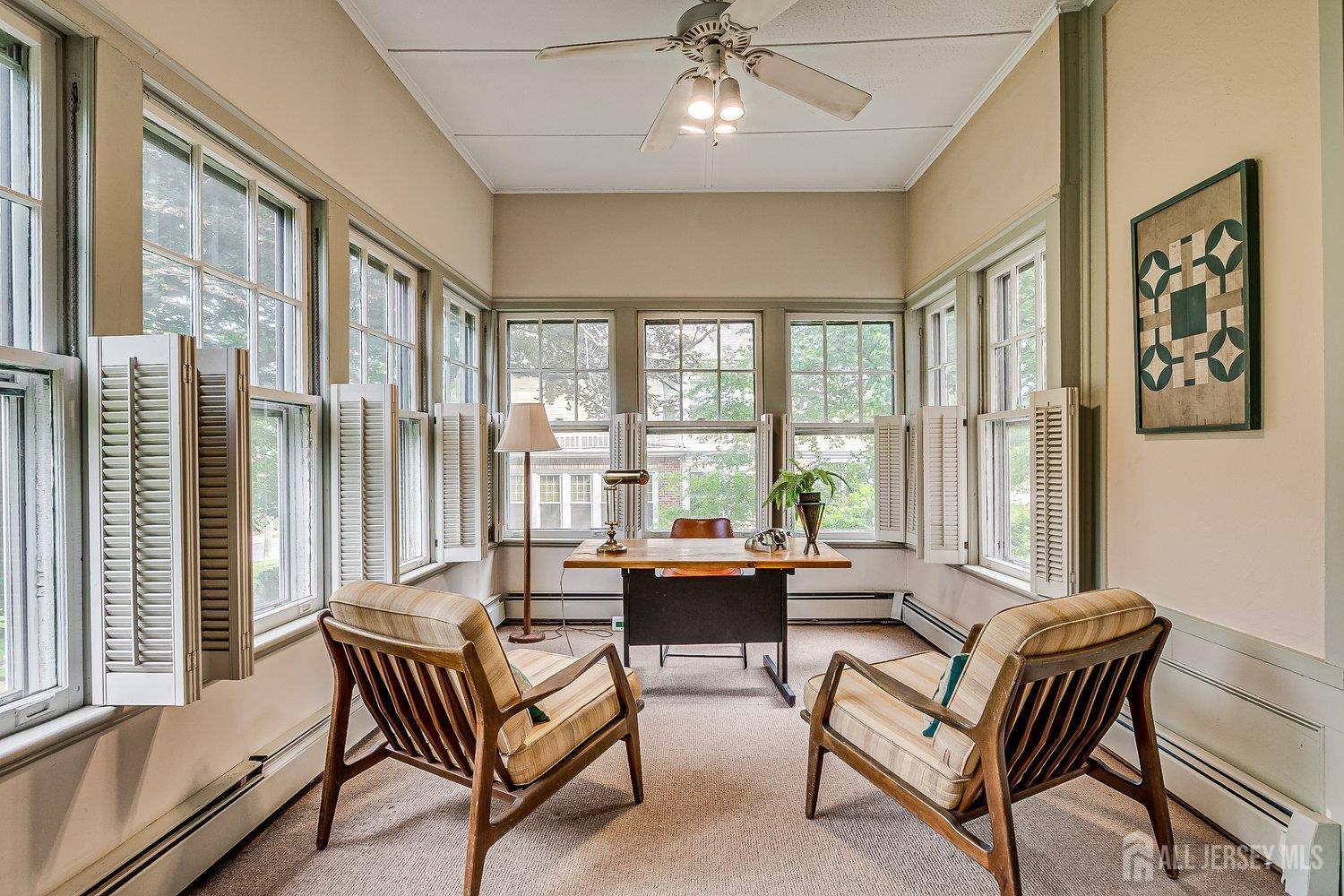 44 Rector Street Metuchen, NJ 08840 - Photo 29 of 65 a living room with furniture and a large window