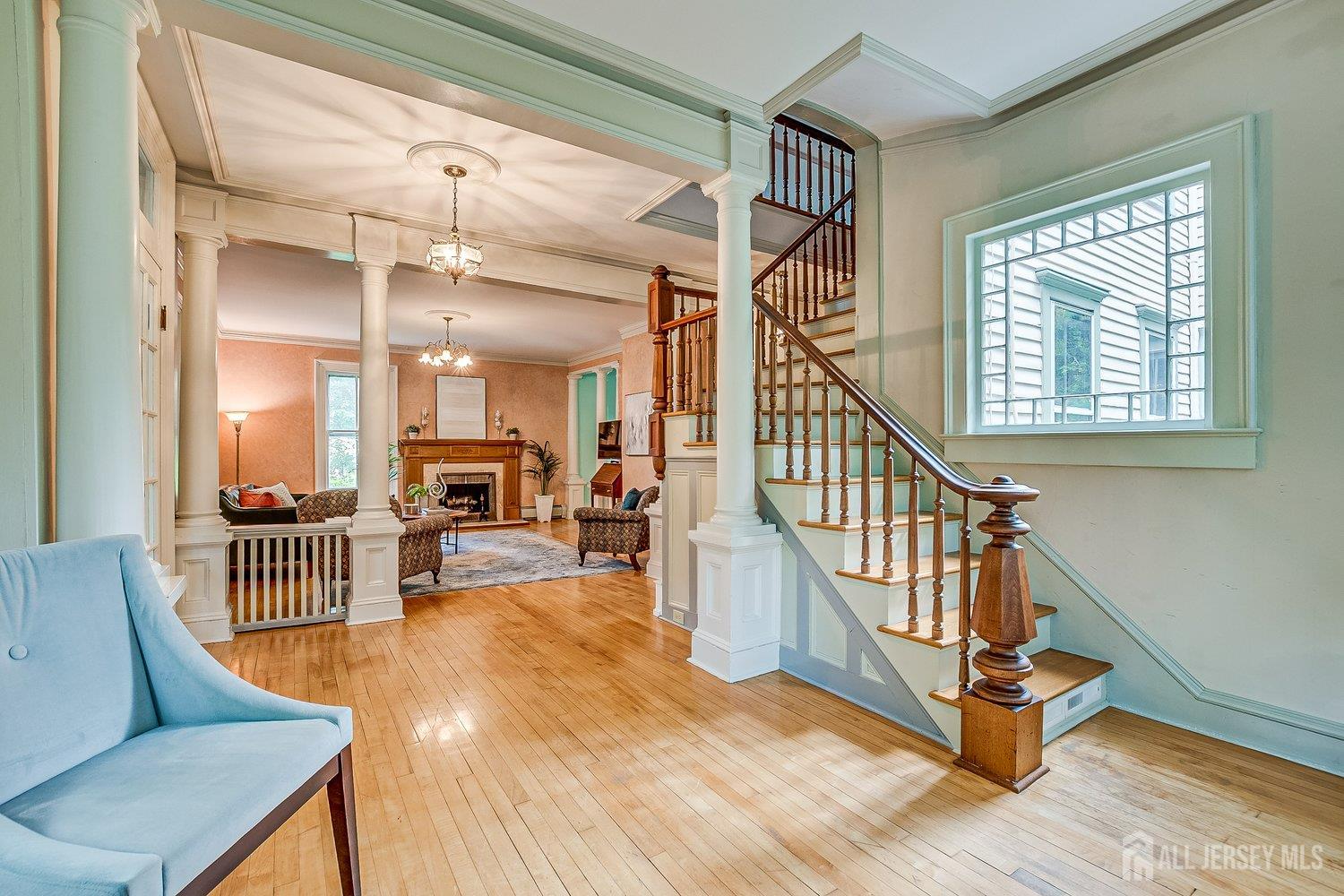 44 Rector Street Metuchen, NJ 08840 - Photo 32 of 65 a view of a livingroom with furniture wooden floor and windows