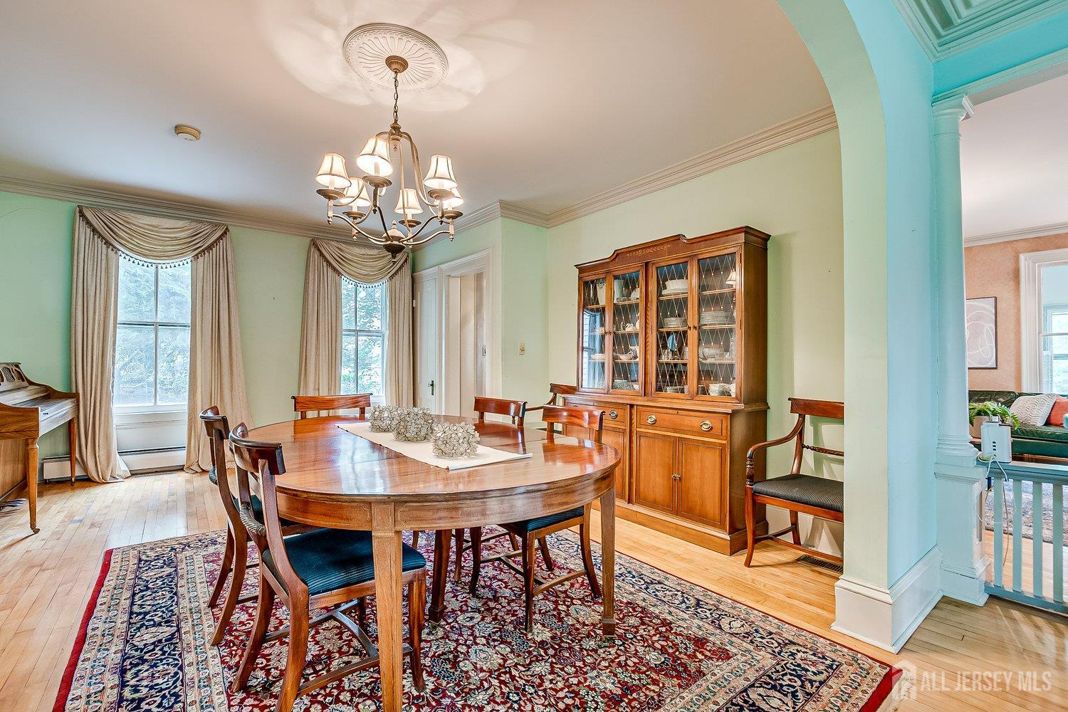 44 Rector Street Metuchen, NJ 08840 - Photo 37 of 65 a view of a dining room with furniture window and wooden floor