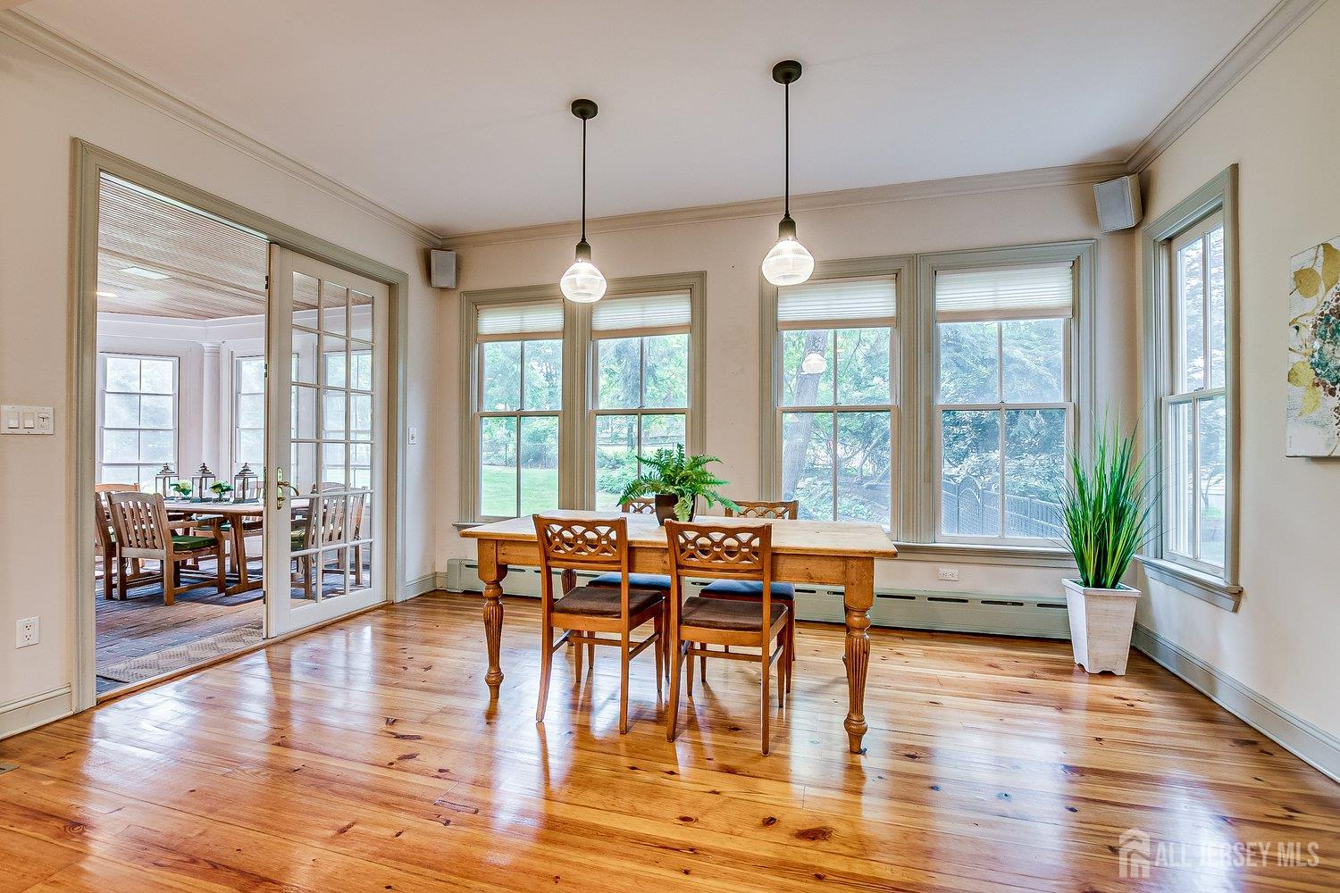 44 Rector Street Metuchen, NJ 08840 - Photo 40 of 65 a view of a dining room with furniture window and wooden floor