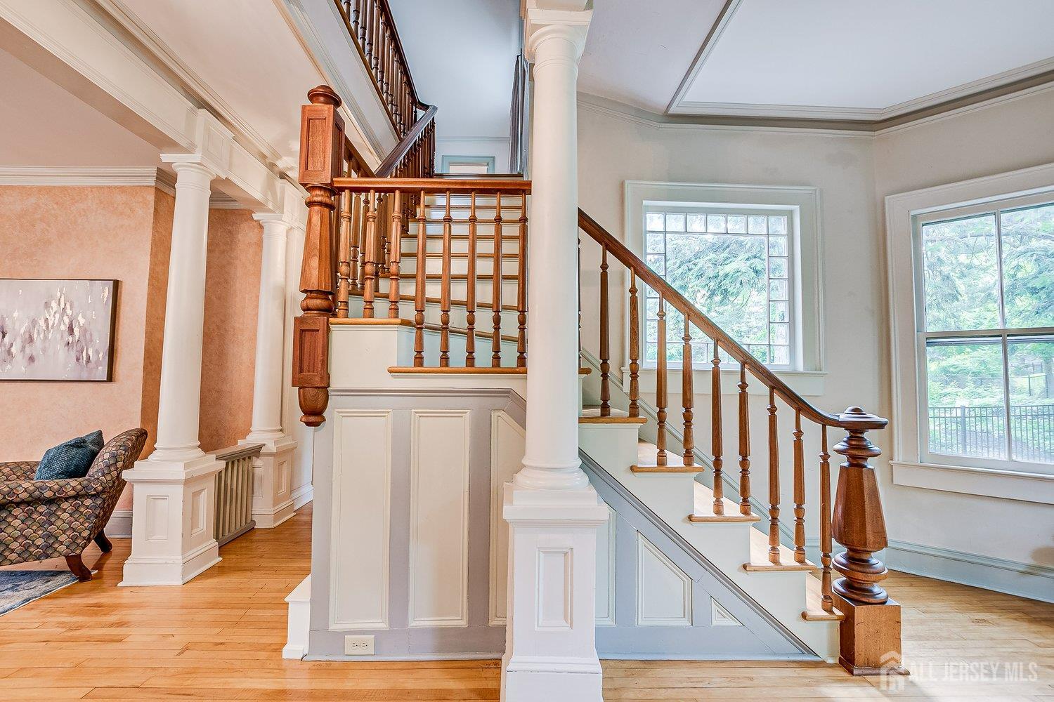 44 Rector Street Metuchen, NJ 08840 - Photo 46 of 65 a view of an entryway wooden floor and chandelier