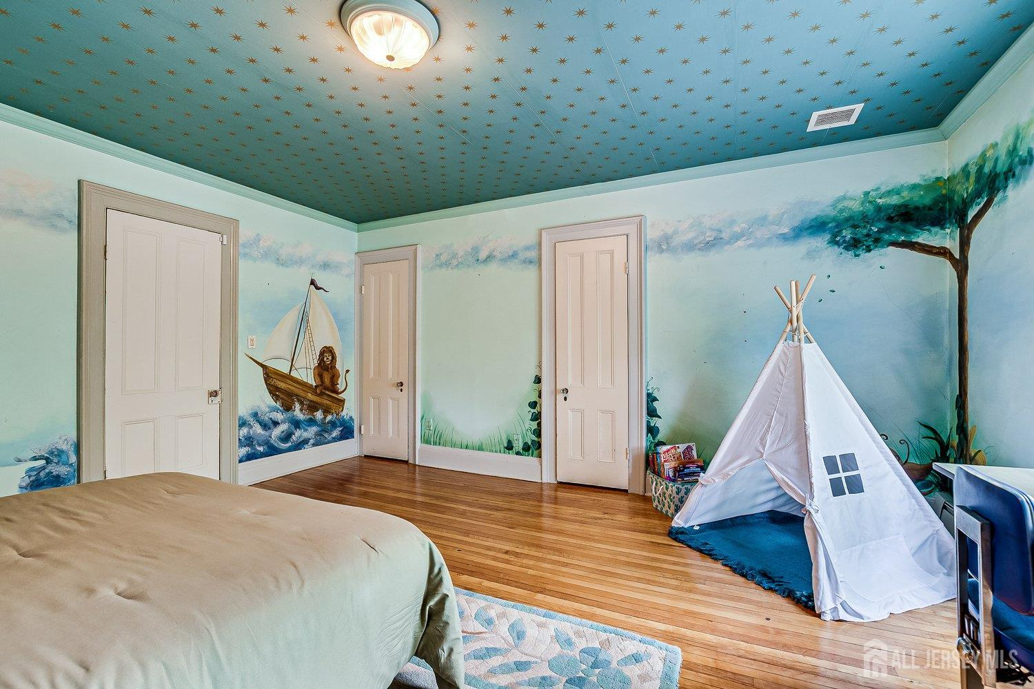 44 Rector Street Metuchen, NJ 08840 - Photo 55 of 65 a bedroom with a bed and a dresser