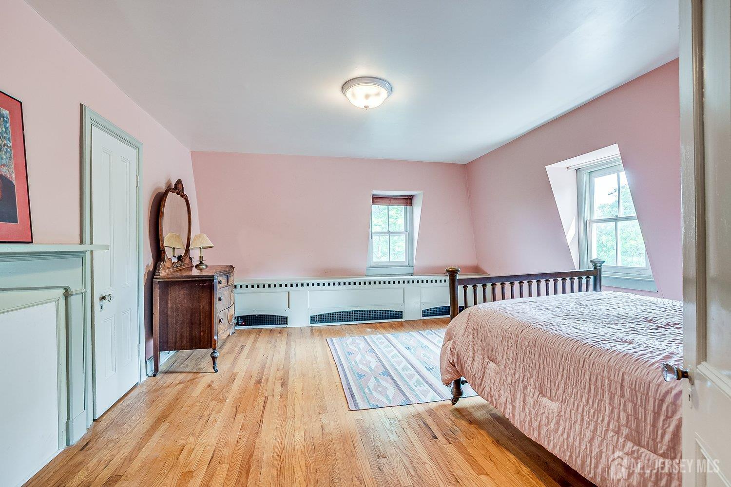 44 Rector Street Metuchen, NJ 08840 - Photo 59 of 65 a bedroom with a bed and a window