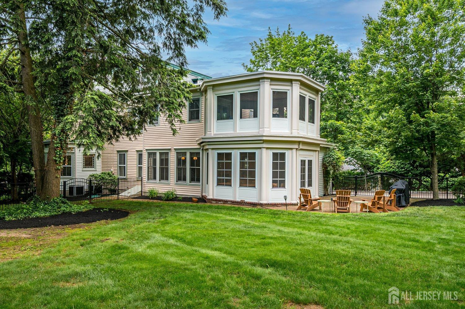 44 Rector Street Metuchen, NJ 08840 - Photo 6 of 65 a front view of a house with a yard