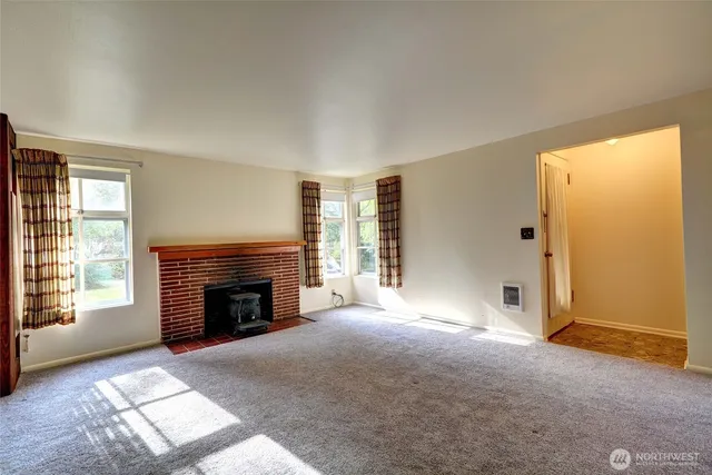 an empty room with windows