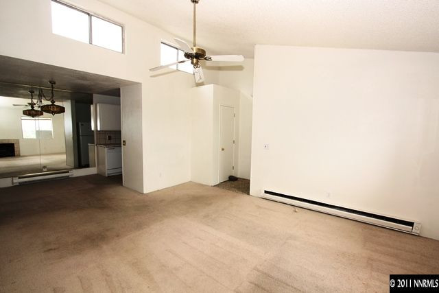 2080 Highview Court, Unit 8 Reno, NV 89512 - Photo 3 of 11 a view of a room with closet and a chandelier