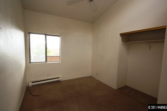 2080 Highview Court, Unit 8 Reno, NV 89512 - Photo 5 of 11 an empty room with a empty space and windows
