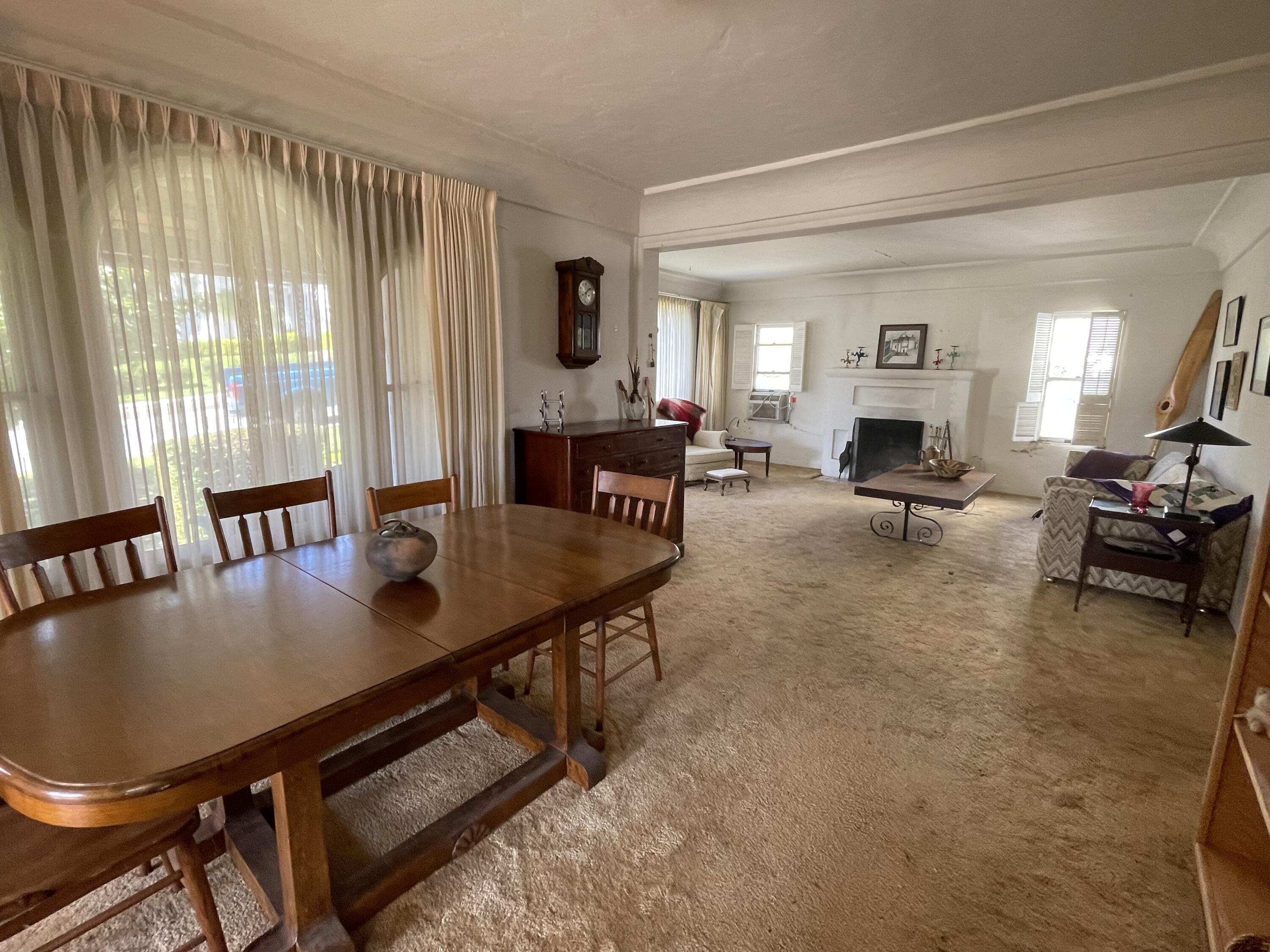 629 North Mill Street Santa Paula, CA 93060 - Photo 4 of 11 a living room with fireplace furniture and a large window