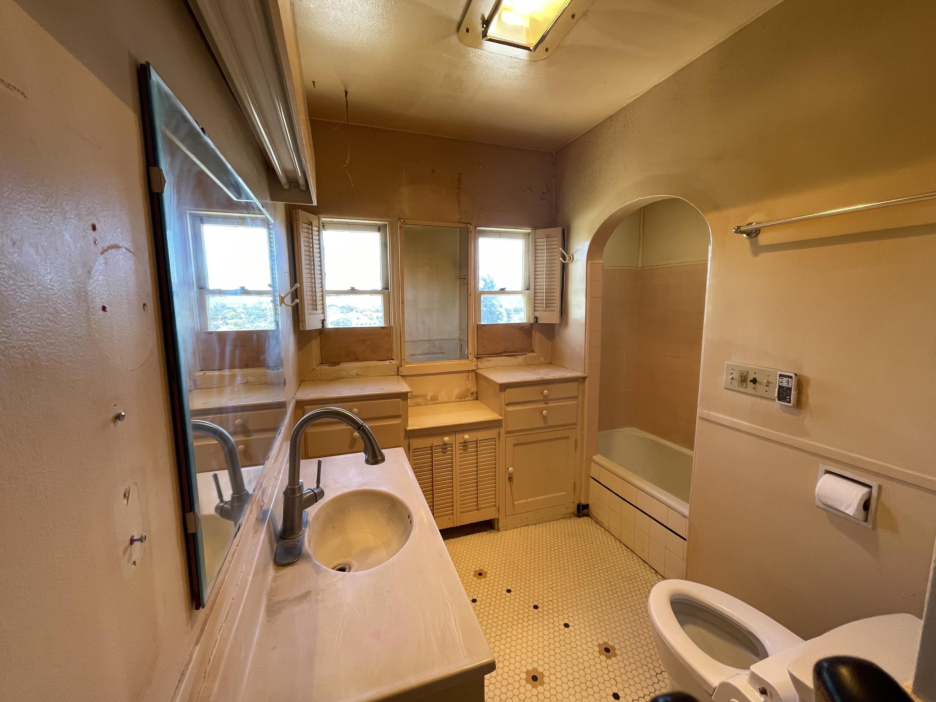 629 North Mill Street Santa Paula, CA 93060 - Photo 8 of 11 a bathroom with a sink toilet and shower