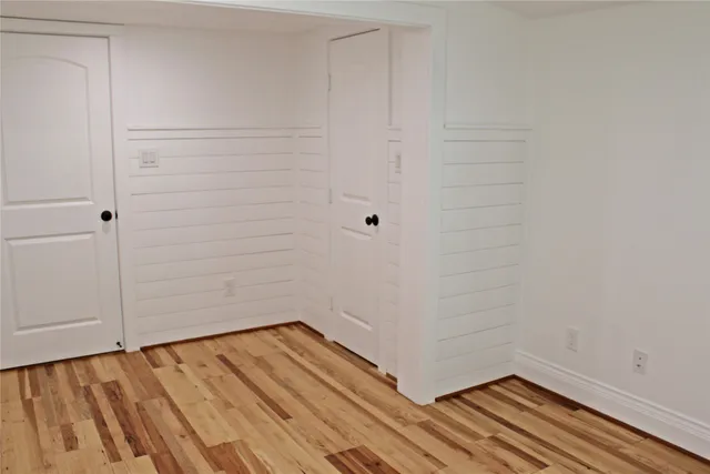 a room with a table and chairs