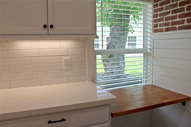 a view of a bathroom with a window