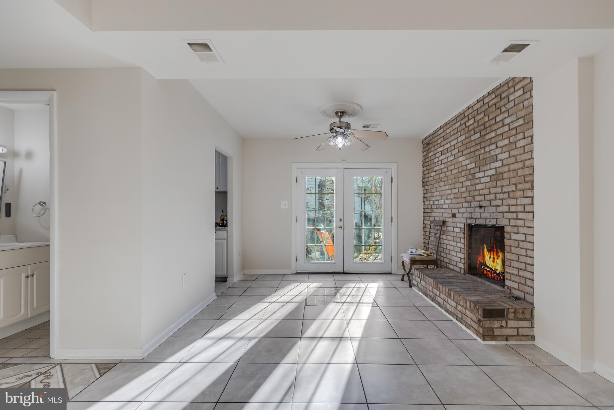 6555 Bock Road Oxon Hill, MD 20745 - Photo 6 of 23 SIT BY THE FIRPLACE