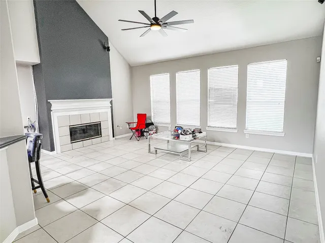 a view of a livingroom with furniture and a fireplace