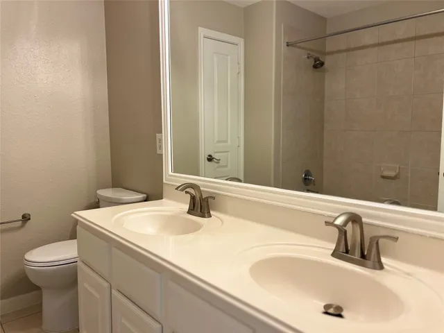 a bathroom with a sink and a toilet