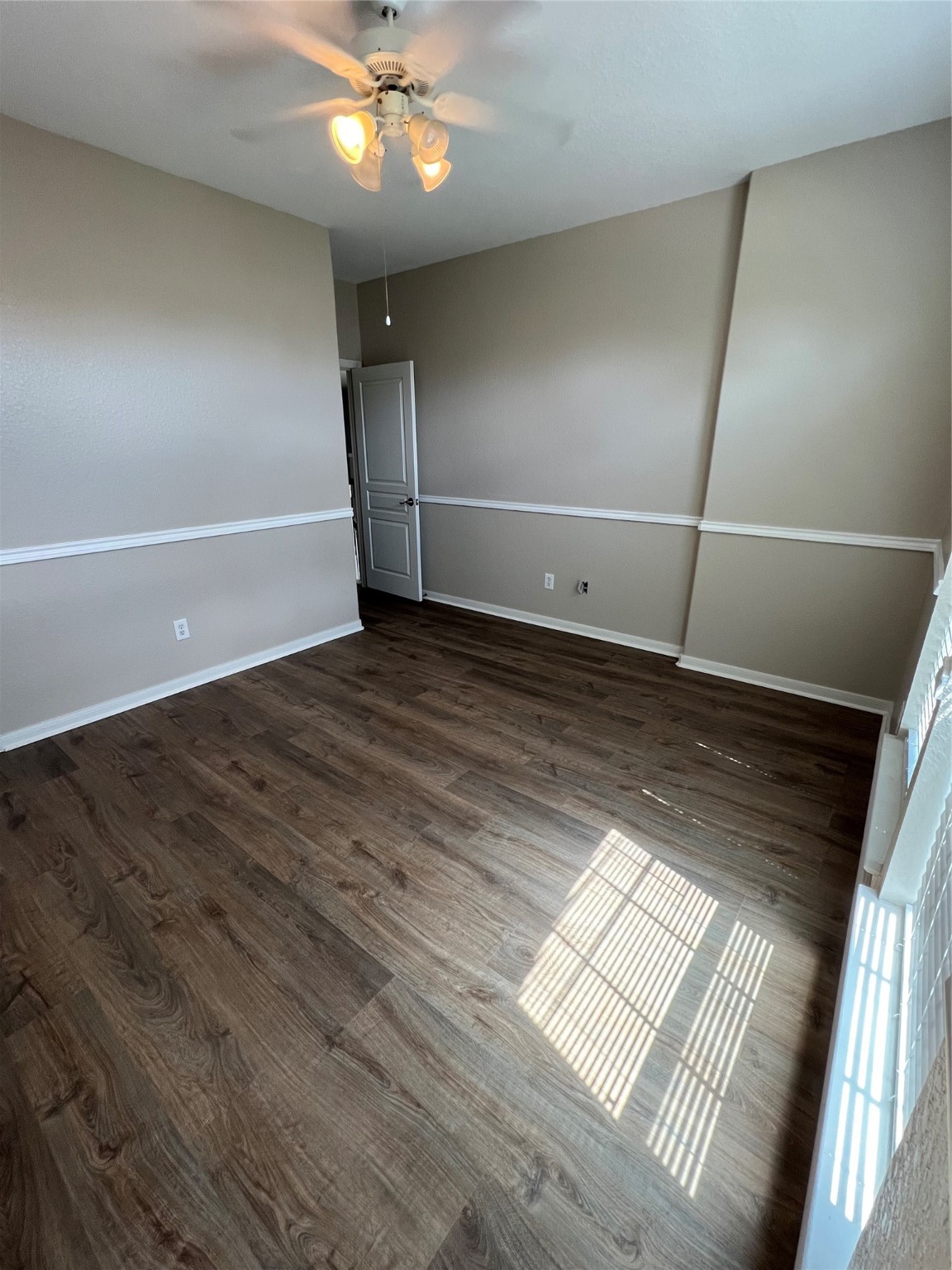 519 Savannah Springs Way Spring, TX 77373 - Photo 19 of 22 a view of an empty room and wooden floor