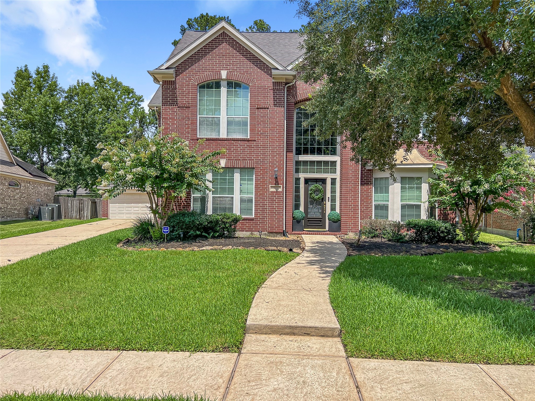 519 Savannah Springs Way Spring, TX 77373 - Photo 2 of 22 front view of a house with a yard