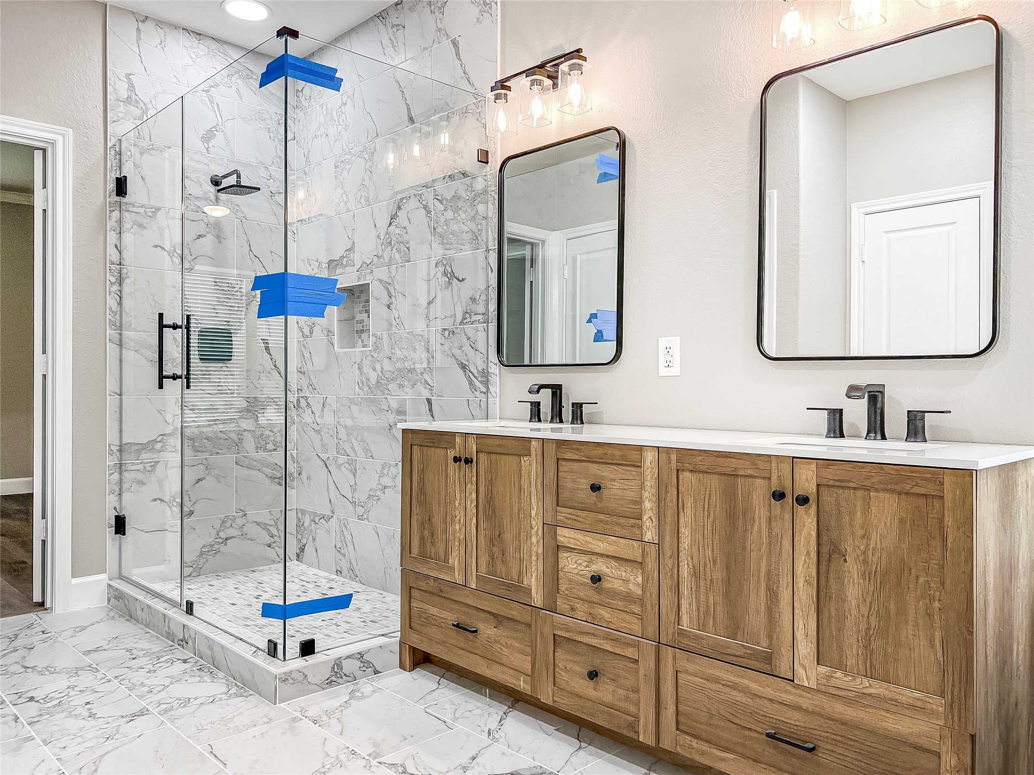 519 Savannah Springs Way Spring, TX 77373 - Photo 7 of 22 a bathroom with double vanity sink and a mirror