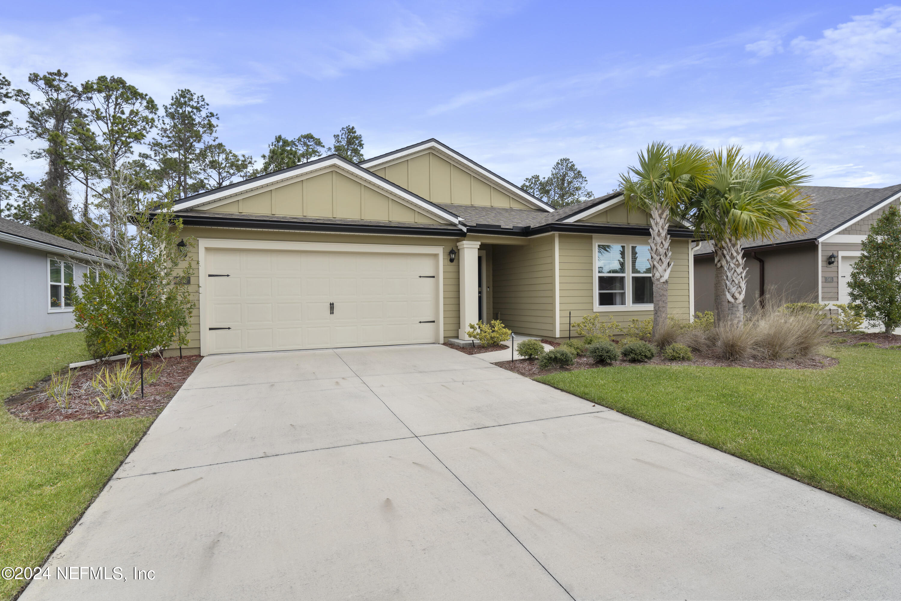 548 Palace Drive St. Augustine, FL 32084 - Photo 15 of 19 a view of garage and yard